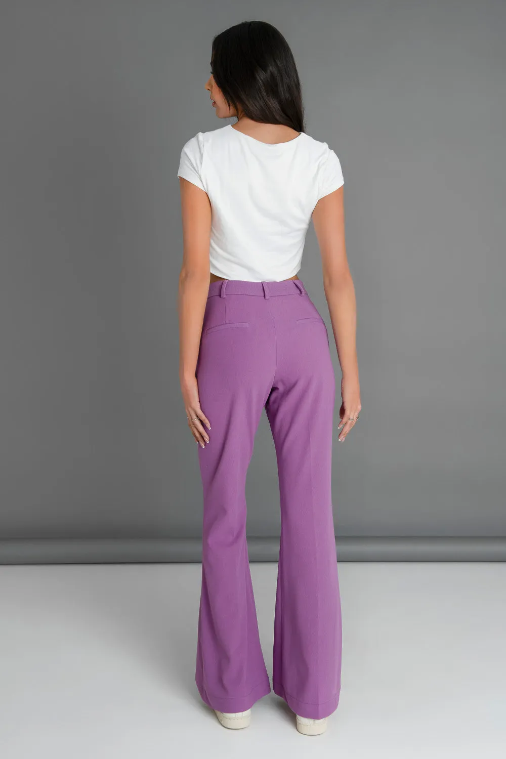 Pantalón ajustado fit flare cintura alta