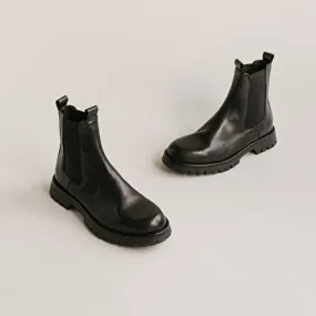 Platform boots in black leather